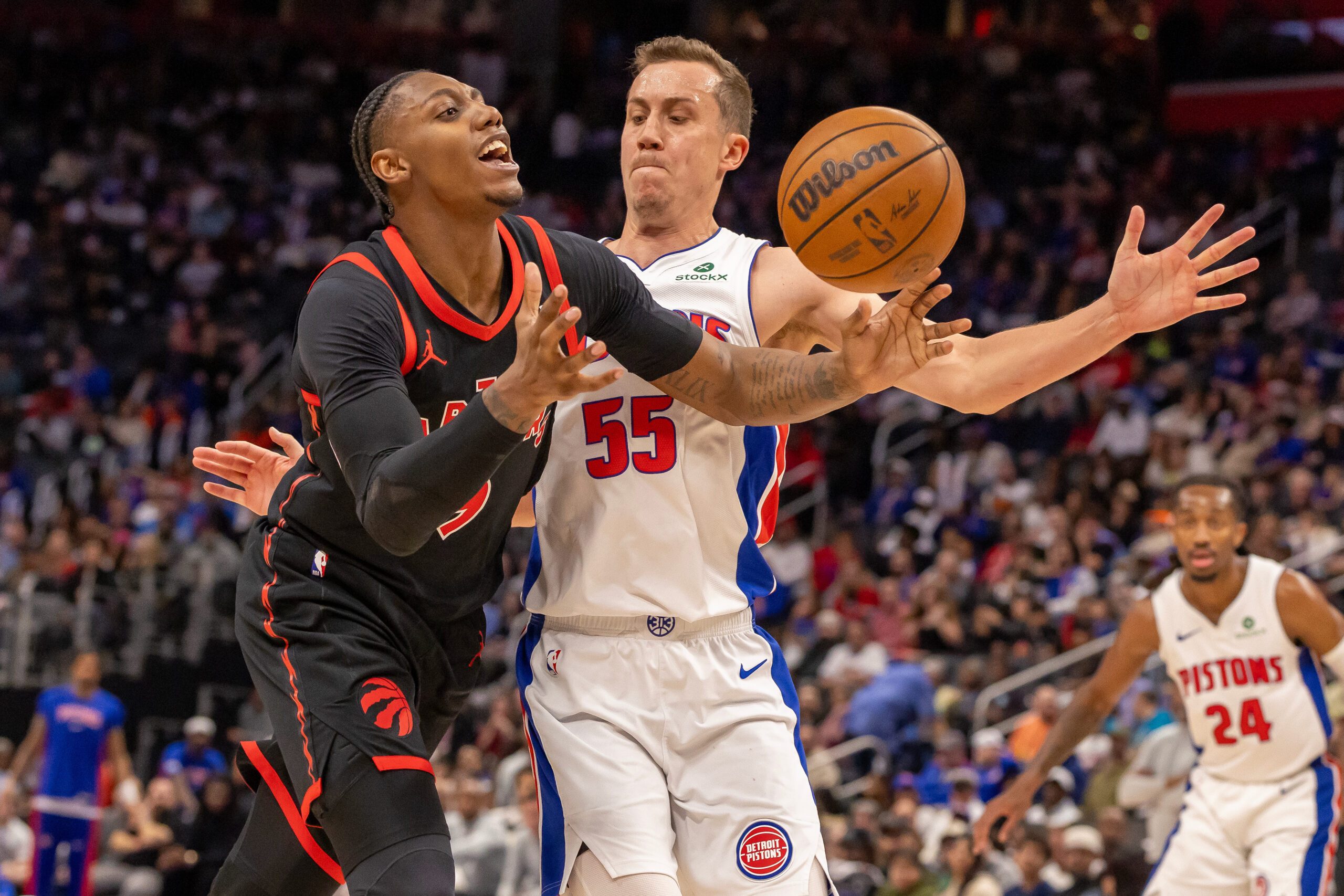 Mar 31, 2026; Detroit, Michigan, USA; Detroit Pistons Duncan Robinson (55) defends as Toronto Raptors RJ Barrett (9) looses the ball during the second half at Little Caesars Arena. Mandatory Credit: David Reginek-Imagn Images