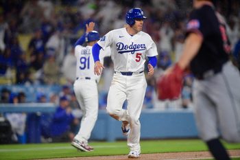 Mar 31, 2026; Los Angeles, California, USA; Los Angeles Dodgers first baseman Freddie Freeman (5) runs home to score against the Cleveland Guardians during the eighth inning at Dodger Stadium. Mandatory Credit: Gary A. Vasquez-Imagn Images
