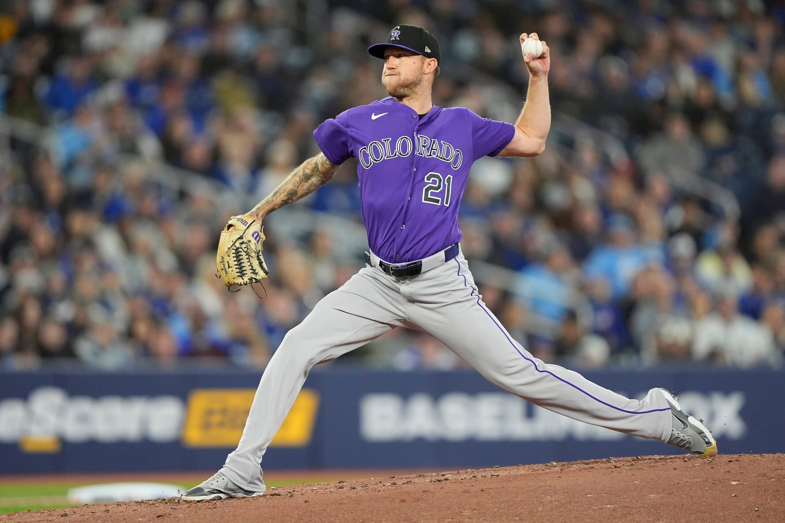 Apr 1, 2026; Toronto, Ontario, CAN; Colorado Rockies starting pitcher Kyle Freeland (21) pitches to the Toronto Blue Jays during the second inning at Rogers Centre. Mandatory Credit: John E. Sokolowski-Imagn Images