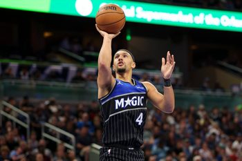 Apr 1, 2026; Orlando, Florida, USA; Orlando Magic guard Jalen Suggs (4) shoots the ball against the Atlanta Hawks in the third quarter at Kia Center. Mandatory Credit: Nathan Ray Seebeck-Imagn Images