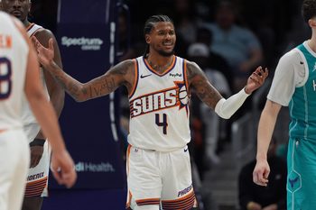 Apr 2, 2026; Charlotte, North Carolina, USA; Phoenix Suns guard Jalen Green (4) reacts to a foul call during the second half against the Charlotte Hornets at Spectrum Center. Mandatory Credit: Jim Dedmon-Imagn Images