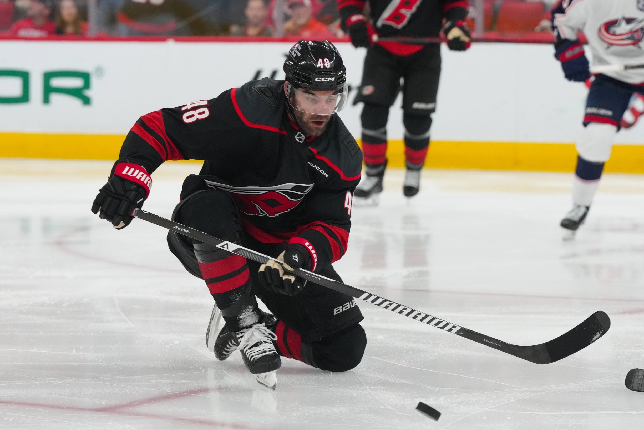 Apr 2, 2026; Raleigh, North Carolina, USA;  Carolina Hurricanes left wing Jordan Martinook (48) watches his blocked shot against the Columbus Blue Jackets during the third period at Lenovo Center. Mandatory Credit: James Guillory-Imagn Images
