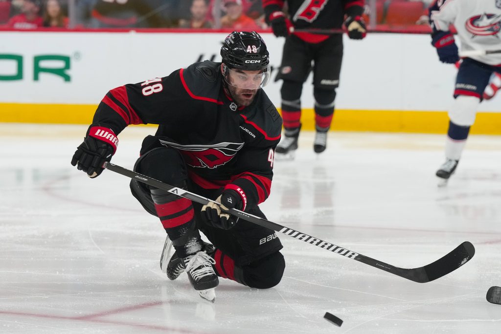 Apr 2, 2026; Raleigh, North Carolina, USA; Carolina Hurricanes left wing Jordan Martinook (48) watches his blocked shot against the Columbus Blue Jackets during the third period at Lenovo Center. Mandatory Credit: James Guillory-Imagn Images