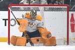 Apr 2, 2026; Los Angeles, California, USA; Nashville Predators goaltender Juuse Saros (74) makes a save against the Los Angeles Kings during the first period at Crypto.com Arena. Mandatory Credit: Griffin Hooper-Imagn Images