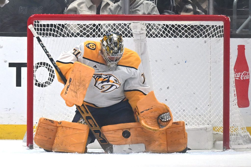 Apr 2, 2026; Los Angeles, California, USA; Nashville Predators goaltender Juuse Saros (74) makes a save against the Los Angeles Kings during the first period at Crypto.com Arena. Mandatory Credit: Griffin Hooper-Imagn Images