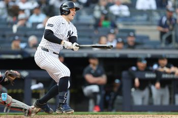 Apr 3, 2026; Bronx, New York, USA; New York Yankees first baseman Ben Rice (22) hist a two-RBI double during the eighth inning against the Miami Marlins at Yankee Stadium. Mandatory Credit: Vincent Carchietta-Imagn Images