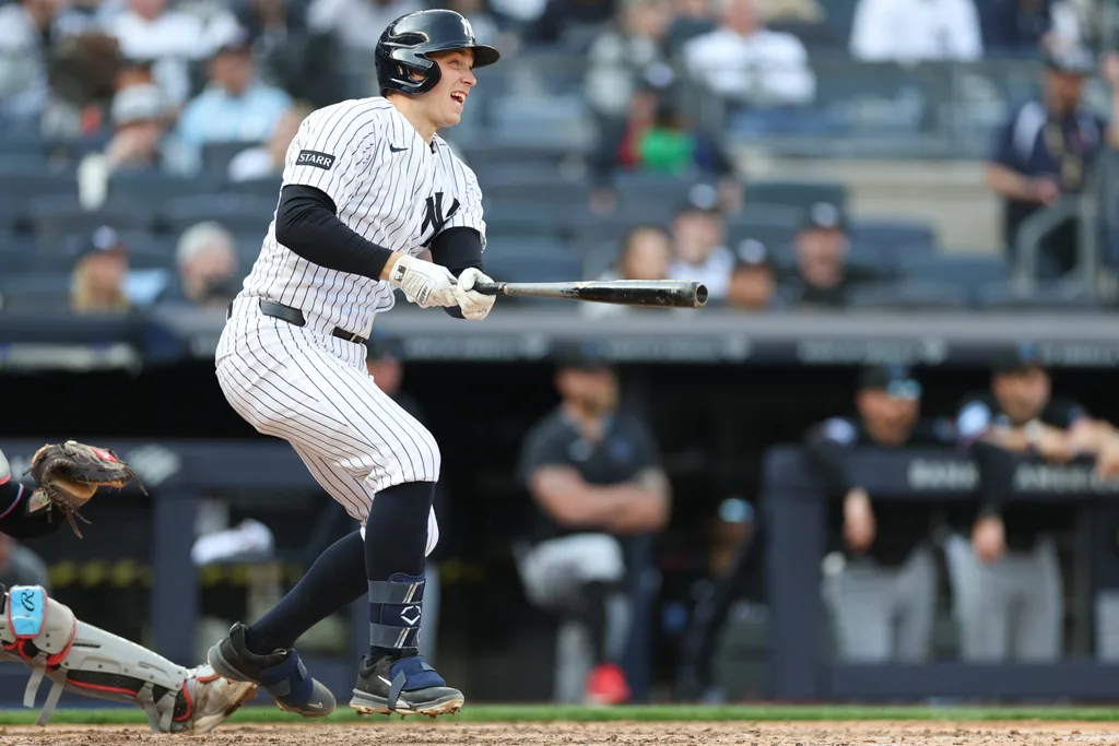 Apr 3, 2026; Bronx, New York, USA; New York Yankees first baseman Ben Rice (22) hist a two-RBI double during the eighth inning against the Miami Marlins at Yankee Stadium. Mandatory Credit: Vincent Carchietta-Imagn Images