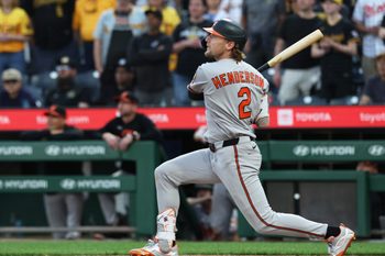 Apr 3, 2026; Pittsburgh, Pennsylvania, USA;  Baltimore Orioles shortstop Gunnar Henderson (2) hits a solo home run against the Pittsburgh Pirates during the ninth inning at PNC Park. Mandatory Credit: Charles LeClaire-Imagn Images