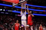 Apr 3, 2026; Houston, Texas, USA; Utah Jazz forward Cody Williams (5) shoots inside inside against Houston Rockets guard Amen Thompson (1) during the second quarter at Toyota Center. Mandatory Credit: Erik Williams-Imagn Images
