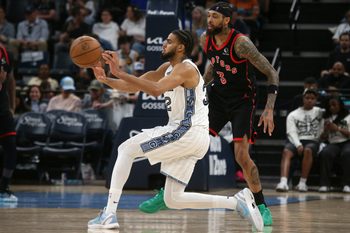 Apr 3, 2026; Memphis, Tennessee, USA; Memphis Grizzlies guard Rayan Rupert (32) passes the ball during the third quarter against the Toronto Raptors at FedExForum. Mandatory Credit: Petre Thomas-Imagn Images
