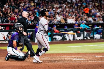 Apr 3, 2026; Phoenix, Arizona, USA; Atlanta Braves second baseman Ozzie Albies (1) hits a solo home run during the ninth inning of the game against the Atlanta Braves at Chase Field. Mandatory Credit: Arianna Grainey-Imagn Images