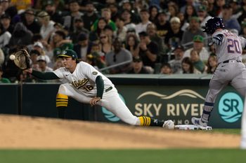 Apr 3, 2026; West Sacramento, California, USA; Houston Astros third baseman Nick Allen (20) beats the throw to Athletics first baseman Nick Kurtz (16) for an infield hit during the seventh inning at Sutter Health Park. Mandatory Credit: D. Ross Cameron-Imagn Images