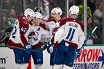 Apr 4, 2026; Dallas, Texas, USA; Colorado Avalanche defenseman Josh Manson (42) and center Nathan MacKinnon (29) and center Martin Necas (88) and center Brock Nelson (11) celebrates an empty goal scored by MacKinnon against the Dallas Stars during the third period at the American Airlines Center. Mandatory Credit: Jerome Miron-Imagn Images