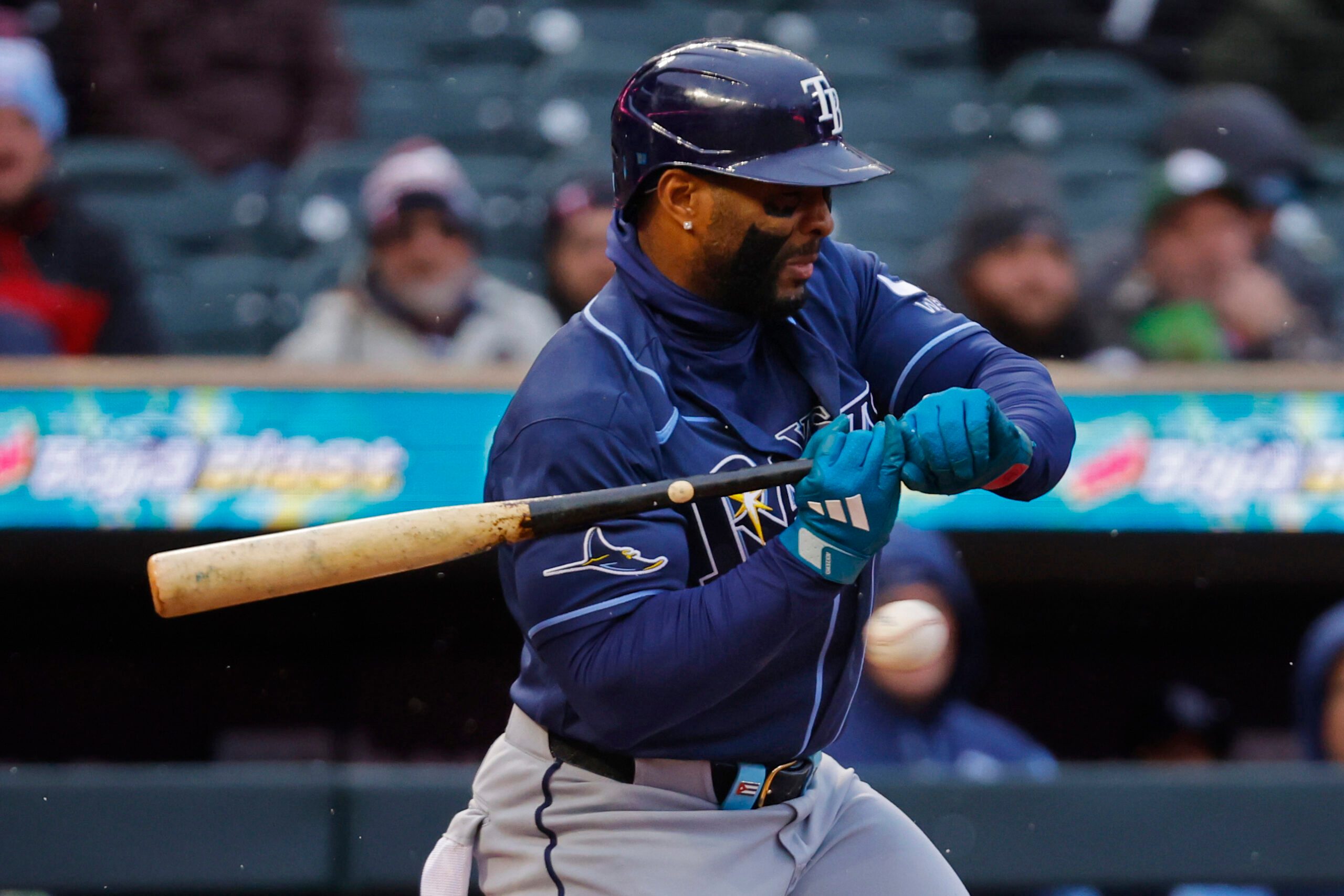 Apr 4, 2026; Minneapolis, Minnesota, USA; Tampa Bay Rays first baseman Yandy Diaz (2) gets hit by a pitch for an RBI against the Minnesota Twins in the second inning at Target Field. Mandatory Credit: Bruce Kluckhohn-Imagn Images