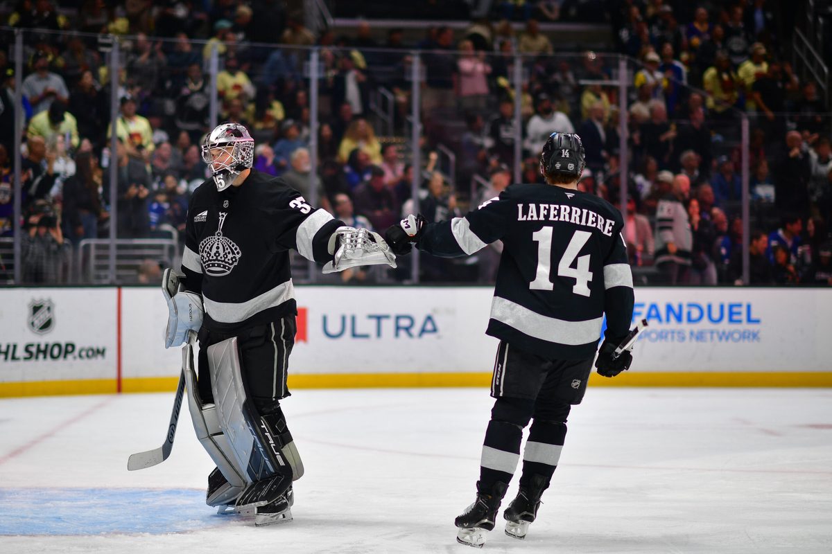 Apr 4, 2026; Los Angeles, California, USA; Los Angeles Kings right wing Alex Laferriere (14) celebrates his goal scored against the Toronto Maple Leafs with goaltender Darcy Kuemper (35) during the third period at Crypto.com Arena. Mandatory Credit: Gary A. Vasquez-Imagn Images