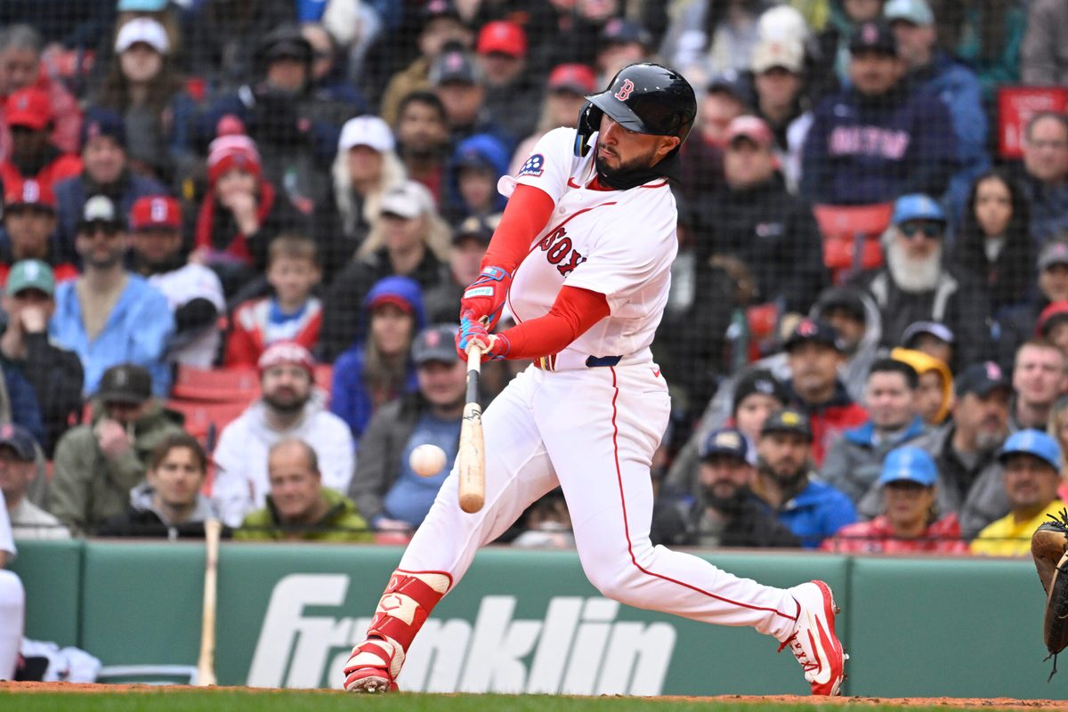 Apr 5, 2026; Boston, Massachusetts, USA; Boston Red Sox right fielder Wilyer Abreu (52) hits a single against the San Diego Padres during the second inning at Fenway Park. Mandatory Credit: Eric Canha-Imagn Images