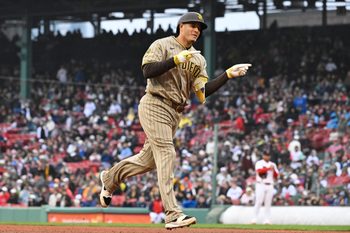 Apr 5, 2026; Boston, Massachusetts, USA; San Diego Padres third baseman Manny MacHado (13) celebrates his three run home run against the Boston Red Sox during the fifth inning at Fenway Park. Mandatory Credit: Eric Canha-Imagn Images