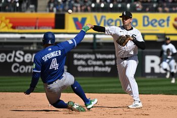 Apr 5, 2026; Chicago, Illinois, USA;  Chicago White Sox shortstop Tanner Murphy throws a double play after forcing out Toronto Blue Jays right fielder George Springer (4) during the fifth inning at Rate Field. Mandatory Credit: Matt Marton-Imagn Images