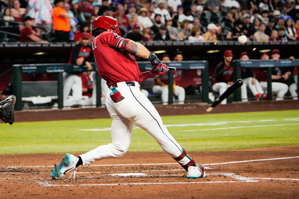 Apr 5, 2026; Phoenix, Arizona, USA; Arizona Diamondbacks right fielder Corbin Carroll (7) breaks his bat against the Atlanta Braves during the fourth inning at Chase Field. Mandatory Credit: Arianna Grainey-Imagn Images