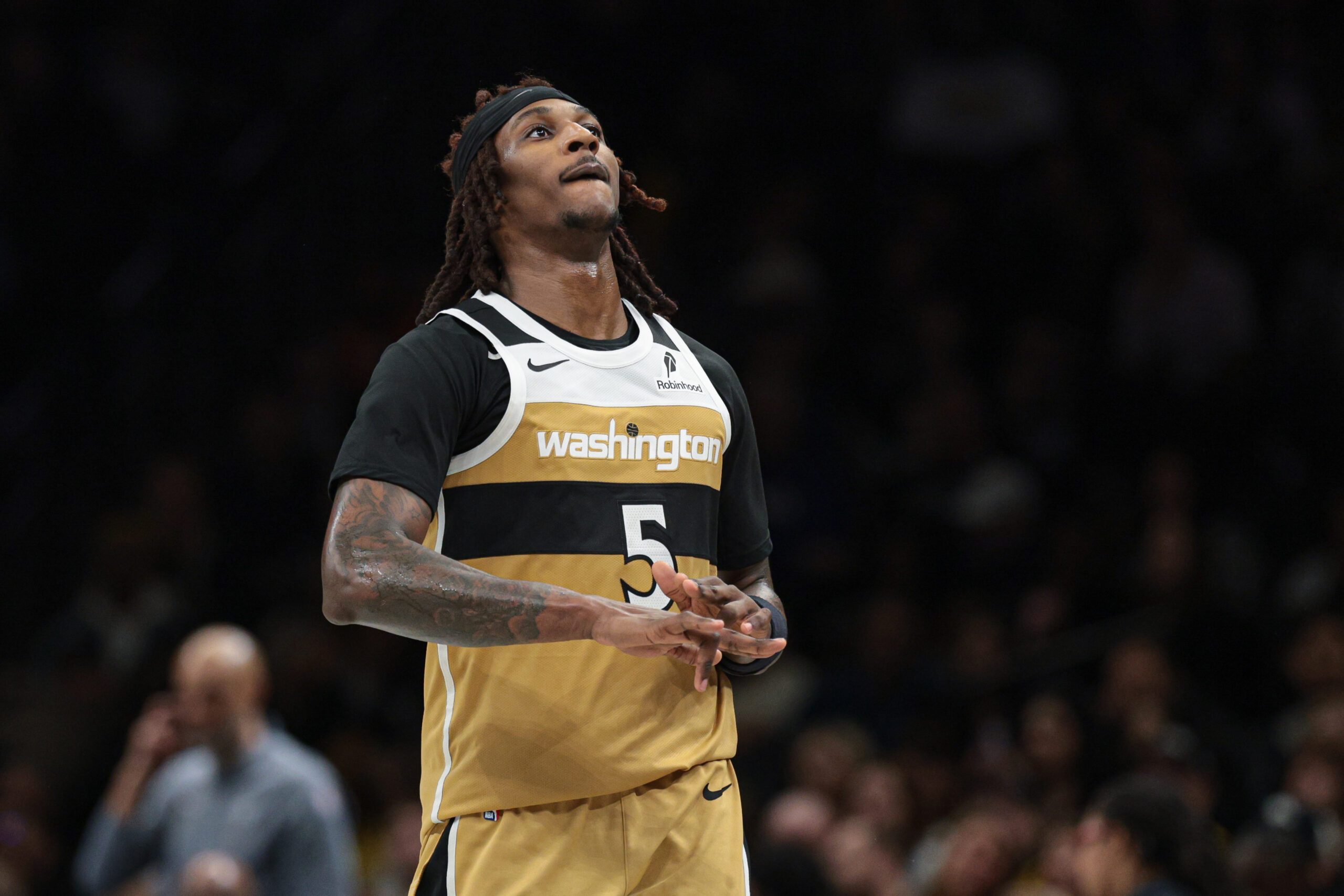 Apr 5, 2026; Brooklyn, New York, USA; Washington Wizards guard Jamir Watkins (5) reacts after making a three point basket during the second half against the Brooklyn Nets at Barclays Center. Mandatory Credit: Vincent Carchietta-Imagn Images