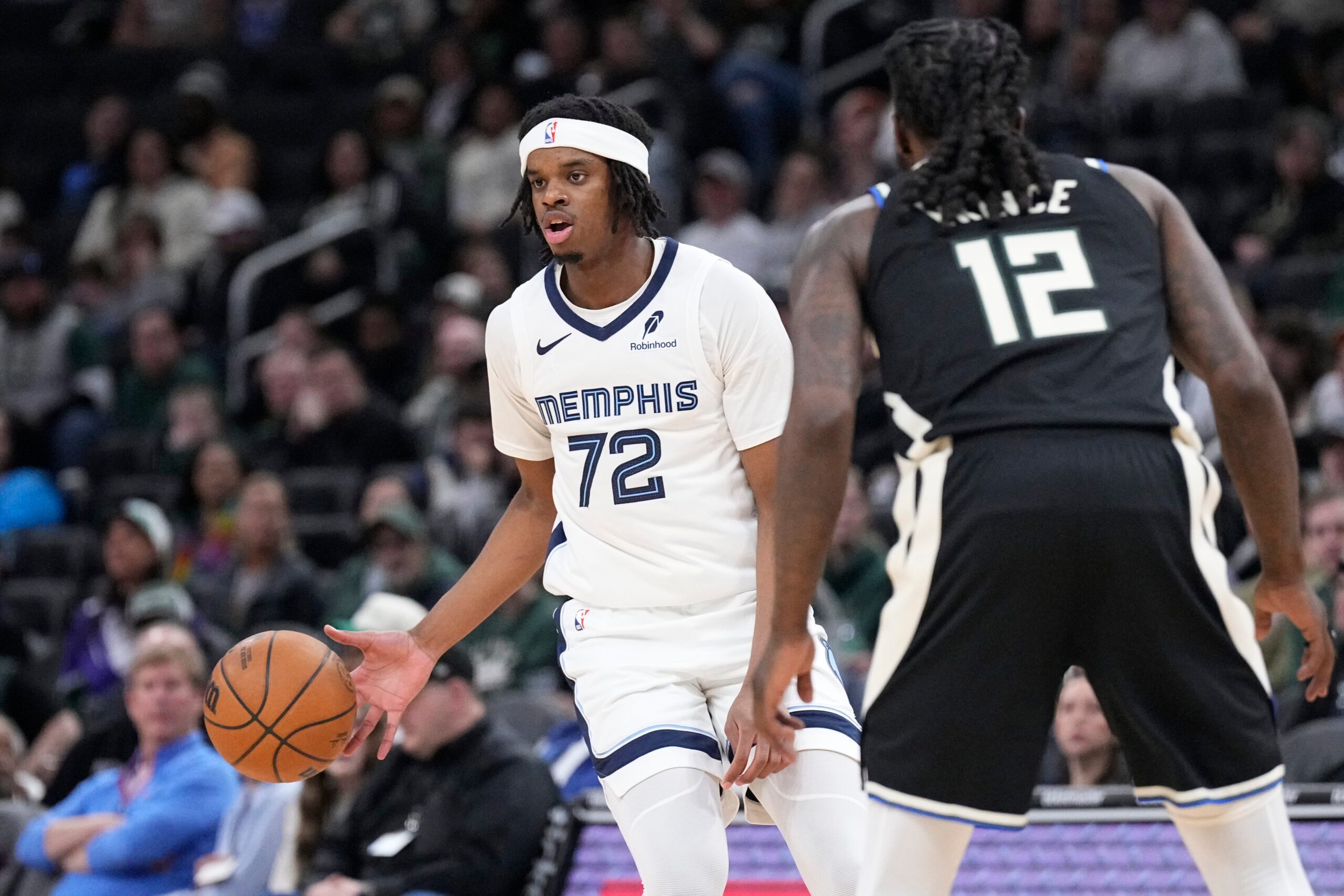 Apr 5, 2026; Milwaukee, Wisconsin, USA; Memphis Grizzlies forward Adam Bal brings the ball up the court against Milwaukee Bucks forward Taurean Prince (12) at Fiserv Forum. Mandatory Credit: Michael McLoone-Imagn Images