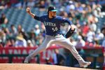 Apr 5, 2026; Anaheim, California, USA; Seattle Mariners pitcher Luis Castillo (58) throws against the Los Angeles Angels during the third inning at Angel Stadium. Mandatory Credit: Gary A. Vasquez-Imagn Images