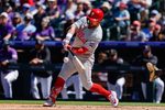 Apr 5, 2026; Denver, Colorado, USA; Philadelphia Phillies designated hitter Kyle Schwarber (12) bats in the third inning against the Colorado Rockies at Coors Field. Mandatory Credit: Isaiah J. Downing-Imagn Images