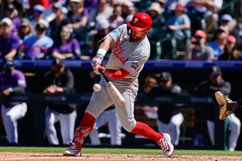 Apr 5, 2026; Denver, Colorado, USA; Philadelphia Phillies designated hitter Kyle Schwarber (12) bats in the third inning against the Colorado Rockies at Coors Field. Mandatory Credit: Isaiah J. Downing-Imagn Images