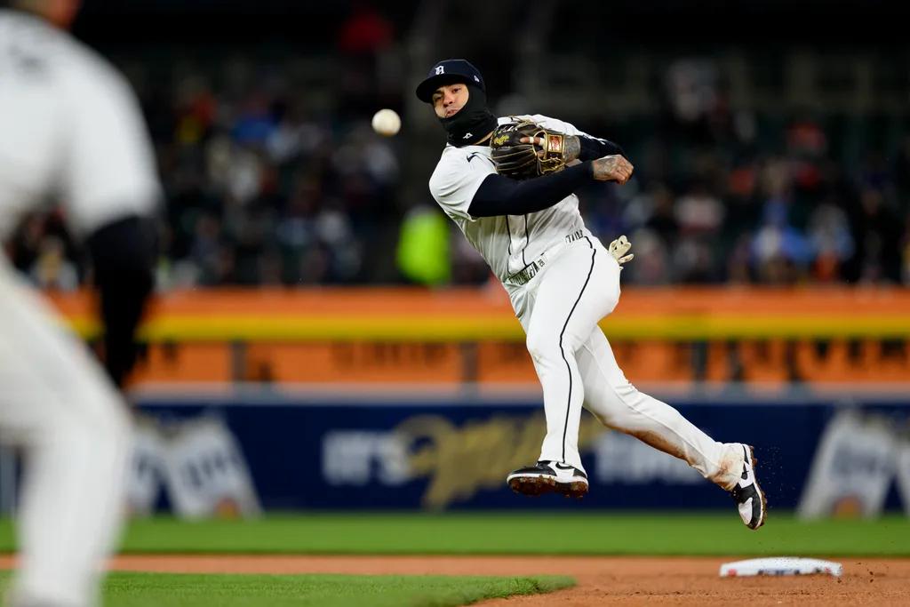 Apr 5, 2026; Detroit, Michigan, USA; Detroit Tigers shortstop Javier Báez (28) throws out a St. Louis Cardinals batter at first base in the sixth inning at Comerica Park. Mandatory Credit: Lon Horwedel-Imagn Images