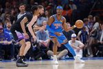 Apr 5, 2026; Oklahoma City, Oklahoma, USA; Oklahoma City Thunder guard Shai Gilgeous-Alexander (2) drives against Utah Jazz guard Svi Mykhailiuk (10) during the second half at Paycom Center. Mandatory Credit: Alonzo Adams-Imagn Images