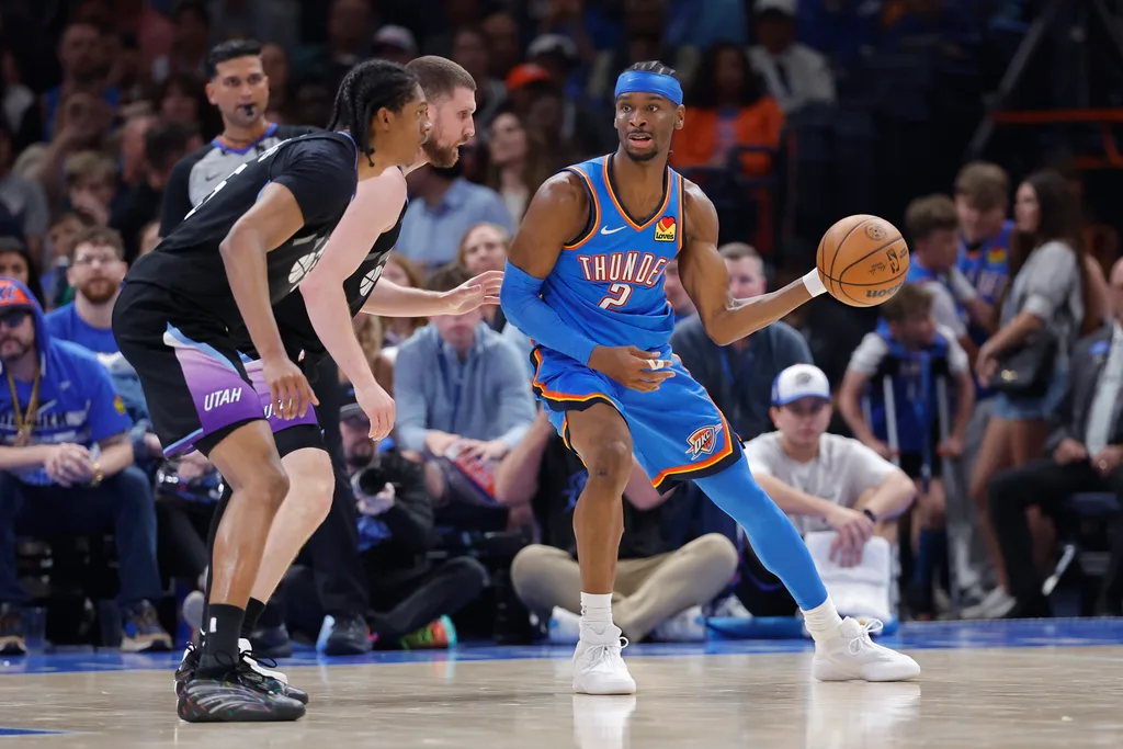Apr 5, 2026; Oklahoma City, Oklahoma, USA; Oklahoma City Thunder guard Shai Gilgeous-Alexander (2) drives against Utah Jazz guard Svi Mykhailiuk (10) during the second half at Paycom Center. Mandatory Credit: Alonzo Adams-Imagn Images