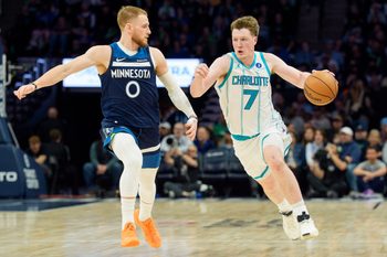 Apr 5, 2026; Minneapolis, Minnesota, USA; Charlotte Hornets guard Kon Knueppel (7) is defended by Charlotte Hornets forward Miles Bridges (0) in the third quarter at Target Center. Mandatory Credit: Matt Blewett-Imagn Images