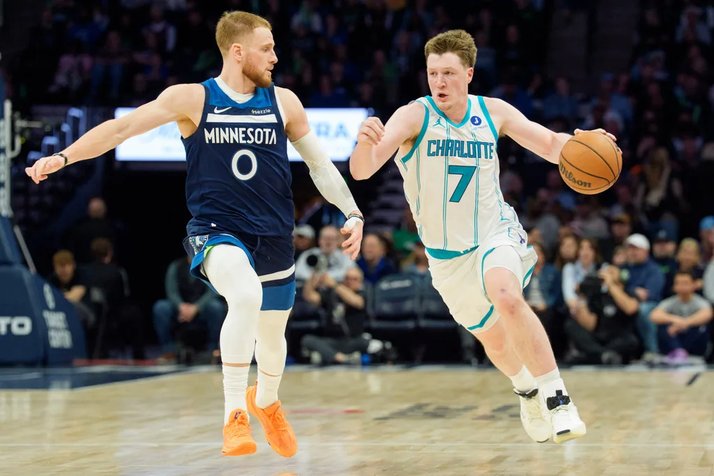 Apr 5, 2026; Minneapolis, Minnesota, USA; Charlotte Hornets guard Kon Knueppel (7) is defended by Charlotte Hornets forward Miles Bridges (0) in the third quarter at Target Center. Mandatory Credit: Matt Blewett-Imagn Images