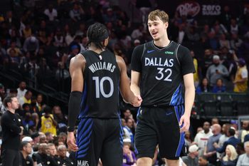 Apr 5, 2026; Dallas, Texas, USA;  Dallas Mavericks forward Cooper Flagg (32) celebrates with Dallas Mavericks guard Brandon Williams (10) during the second half against the Los Angeles Lakers at American Airlines Center. Mandatory Credit: Kevin Jairaj-Imagn Images