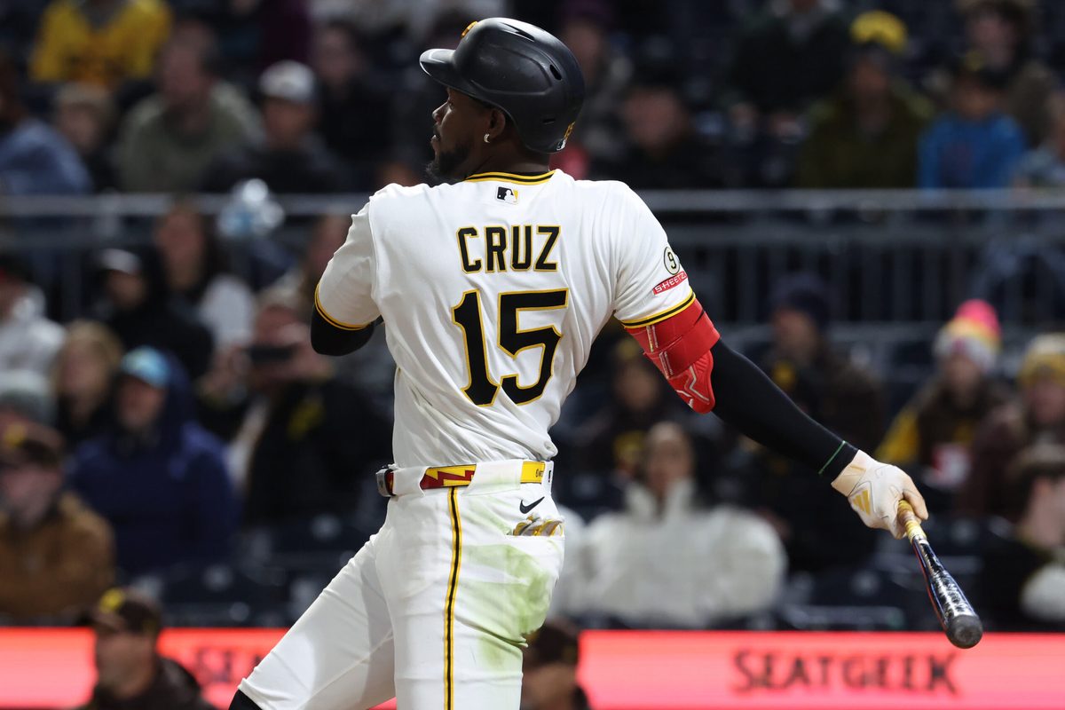 Apr 6, 2026; Pittsburgh, Pennsylvania, USA;  Pittsburgh Pirates center fielder Oneil Cruz (15) hits a single against the San Diego Padres during the fifth inning at PNC Park. Mandatory Credit: Charles LeClaire-Imagn Images