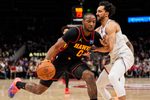 Apr 6, 2026; Atlanta, Georgia, USA; Atlanta Hawks forward Jonathan Kuminga (0) dribbles against New York Knicks guard Landry Shamet (44) during the second half at State Farm Arena. Mandatory Credit: Dale Zanine-Imagn Images