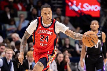 Apr 7, 2026; New Orleans, Louisiana, USA;  New Orleans Pelicans guard Jordan Hawkins (24) dribbles the ball court against the Utah Jazz during the first half at Smoothie King Center. Mandatory Credit: Stephen Lew-Imagn Images