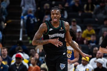 Apr 7, 2026; Indianapolis, Indiana, USA; Minnesota Timberwolves guard Bones Hyland (8) celebrates after a basket in the second half against the Indiana Pacers at Gainbridge Fieldhouse. Mandatory Credit: Trevor Ruszkowski-Imagn Images