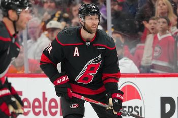 Apr 7, 2026; Raleigh, North Carolina, USA;  Carolina Hurricanes defenseman Jaccob Slavin (74) watches the play against the Boston Bruins during the third period at Lenovo Center. Mandatory Credit: James Guillory-Imagn Images