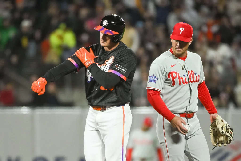 Apr 7, 2026; San Francisco, California, USA; San Francisco Giants third baseman Matt Chapman (26) motions to his team mates after hitting a double during the fifth inning of the game against the Philadelphia Phillies at Oracle Park. Mandatory Credit: Ed Szczepanski-Imagn Images