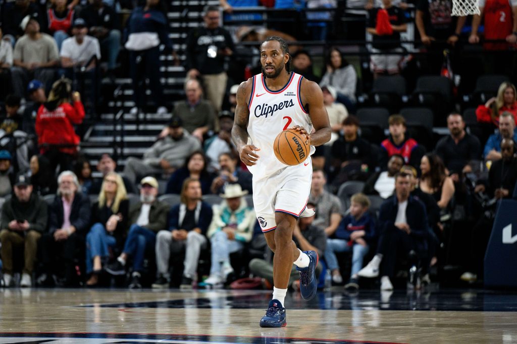 Apr 7, 2026; Inglewood, California, USA; Los Angeles Clippers forward Kawhi Leonard (2) controls the ball during the first half against the Dallas Mavericks at Intuit Dome. Mandatory Credit: William Liang-Imagn Images