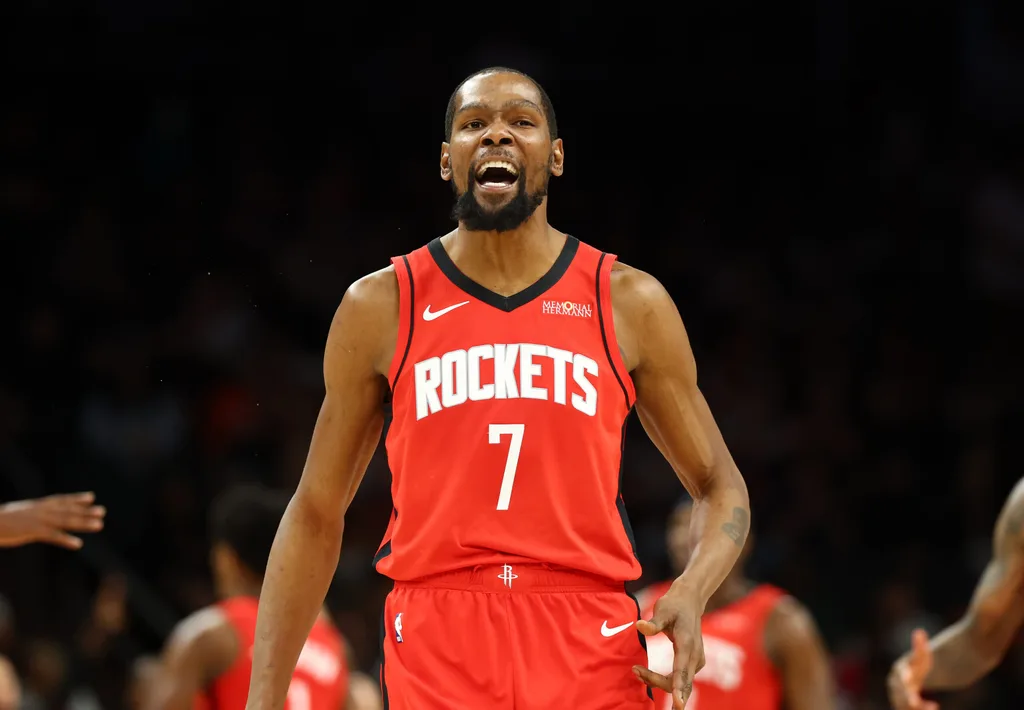 Apr 7, 2026; Phoenix, Arizona, USA; Houston Rockets forward Kevin Durant (7) celebrates a three point shot against the Phoenix Suns in the second half at Mortgage Matchup Center. Mandatory Credit: Mark J. Rebilas-Imagn Images