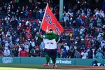 Apr 8, 2026; Boston, Massachusetts, USA; Wally the Boston Red Sox mascot celebrates the team's victory against the Milwaukee Brewers at Fenway Park. Mandatory Credit: Eric Canha-Imagn Images