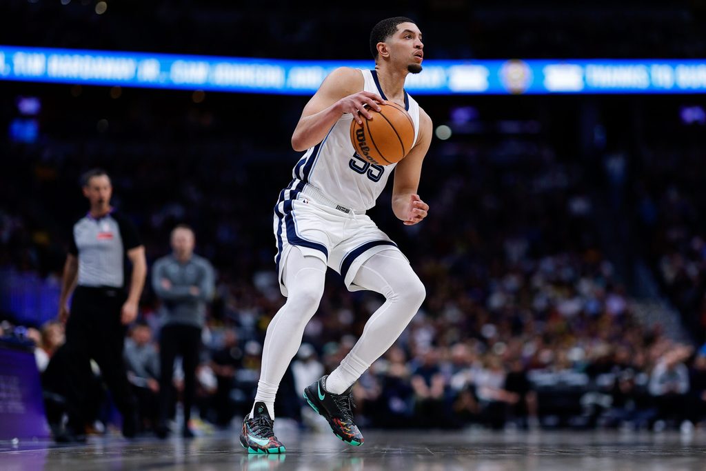Apr 8, 2026; Denver, Colorado, USA; Memphis Grizzlies guard Lucas Williamson (55) controls the ball in the third quarter against the Denver Nuggets at Ball Arena. Mandatory Credit: Isaiah J. Downing-Imagn Images