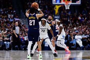 Apr 8, 2026; Denver, Colorado, USA; Denver Nuggets guard Jamal Murray (27) controls the ball against Memphis Grizzlies guard Adama Bal (72) as center Jonas Valanciunas (17) and forward Taylor Hendricks (22) battle for position in the fourth quarter at Ball Arena. Mandatory Credit: Isaiah J. Downing-Imagn Images
