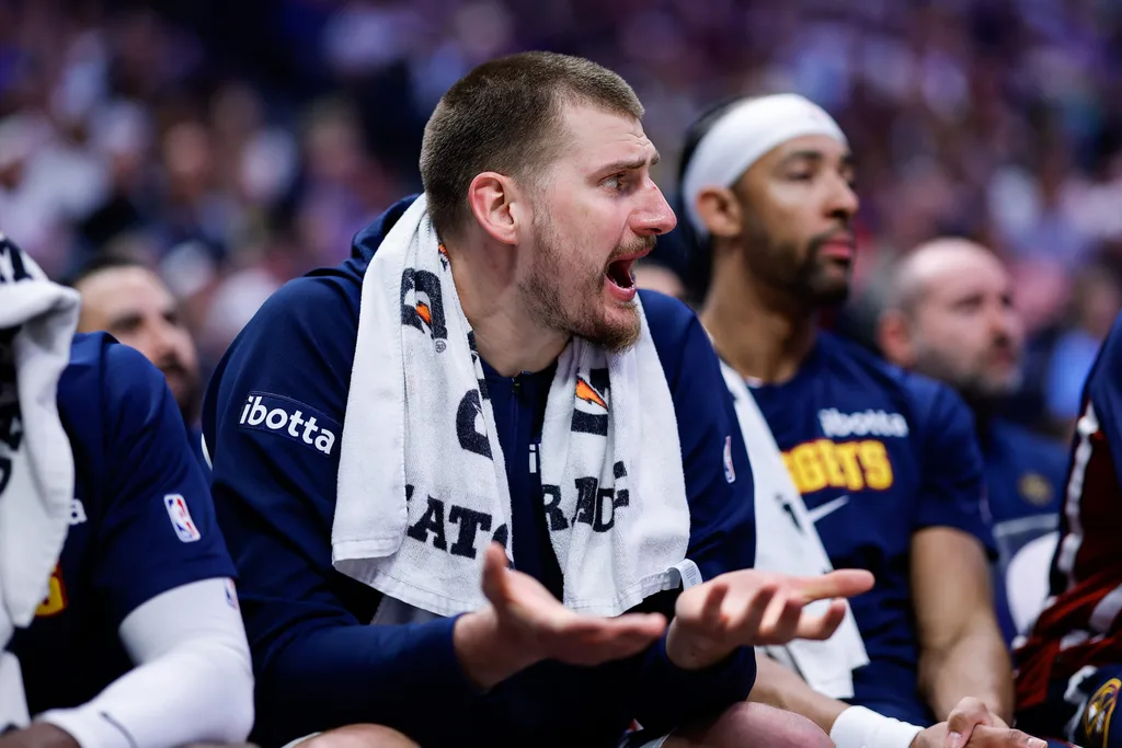 Apr 8, 2026; Denver, Colorado, USA; Denver Nuggets center Nikola Jokic (15) reacts from the bench in the second quarter against the Memphis Grizzlies at Ball Arena. Mandatory Credit: Isaiah J. Downing-Imagn Images
