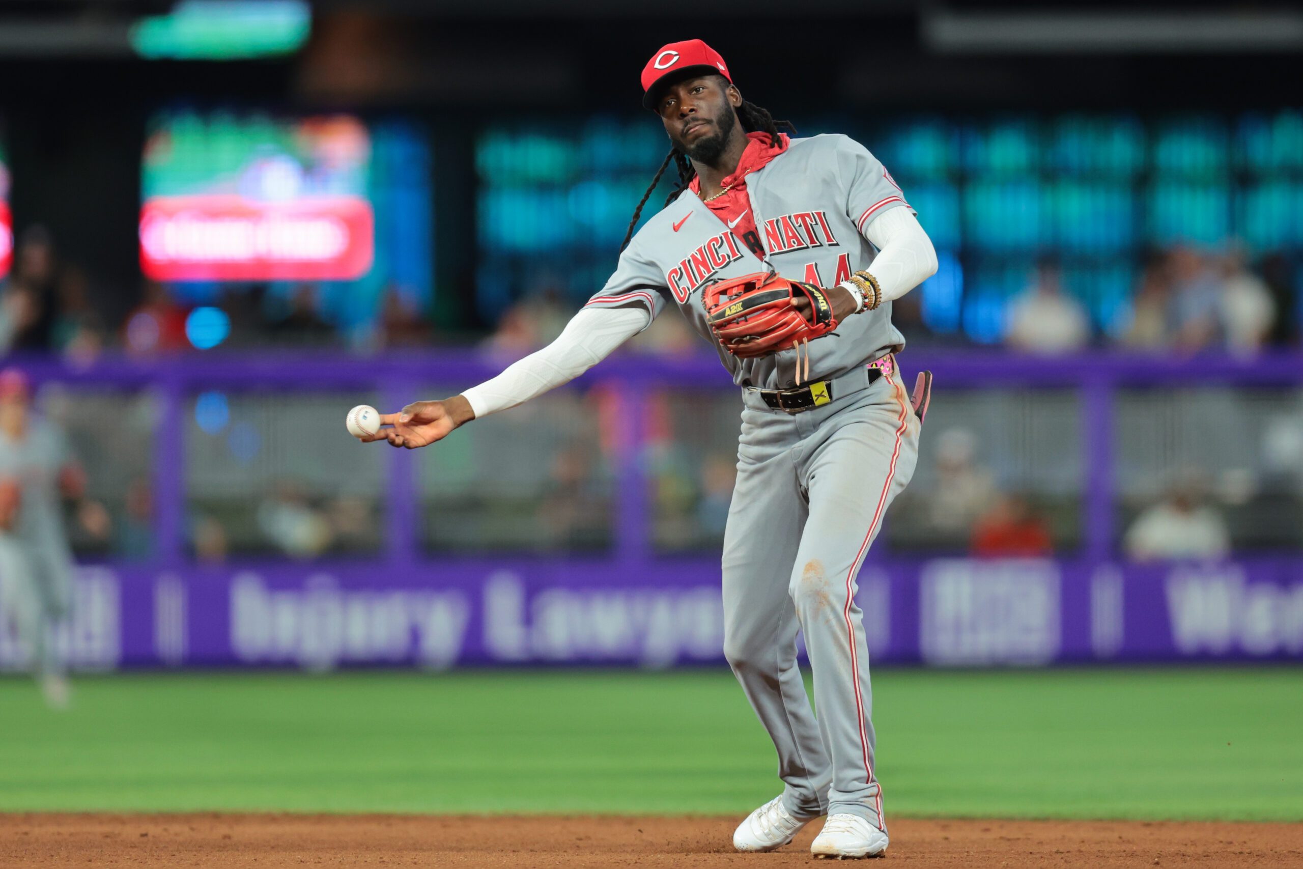 Apr 9, 2026; Miami, Florida, USA; Cincinnati Reds shortstop Elly de la Cruz (44) turns a double play against the Miami Marlins during the eighth inning at loanDepot Park. Mandatory Credit: Sam Navarro-Imagn Images