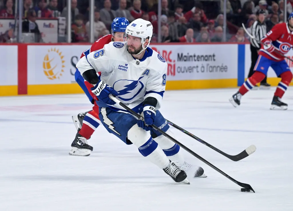 Apr 9, 2026; Montreal, Quebec, CAN;Tampa Bay Lightning forward Nikita Kucherov (86) plays the puck during the second period of the game against the Montreal Canadiens at the Bell Centre. Mandatory Credit: Eric Bolte-Imagn Images