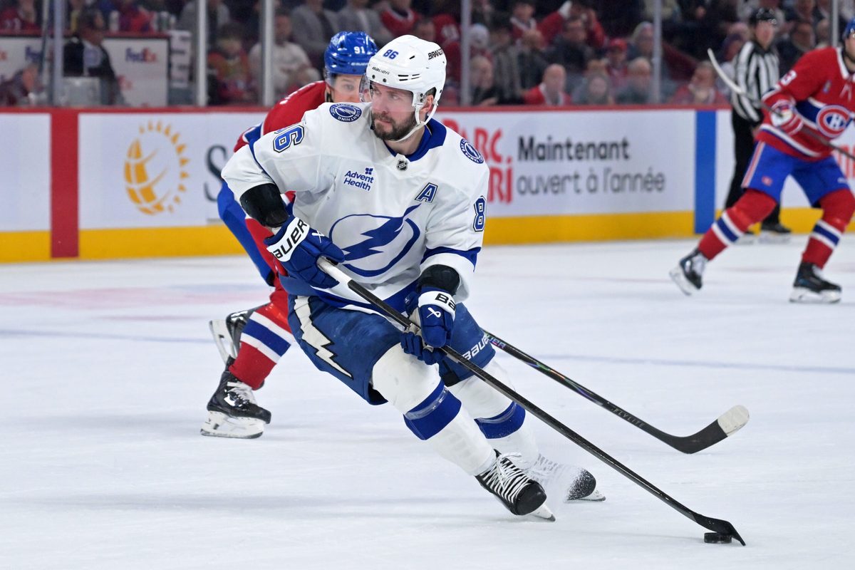 Apr 9, 2026; Montreal, Quebec, CAN;Tampa Bay Lightning forward Nikita Kucherov (86) plays the puck during the second period of the game against the Montreal Canadiens at the Bell Centre. Mandatory Credit: Eric Bolte-Imagn Images