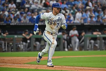Apr 9, 2026; Kansas City, Missouri, USA;  Kansas City Royals shortstop Bobby Witt Jr. (7) runs after hitting a double in the third inning against the Chicago White Sox at Kauffman Stadium. Mandatory Credit: Peter Aiken-Imagn Images